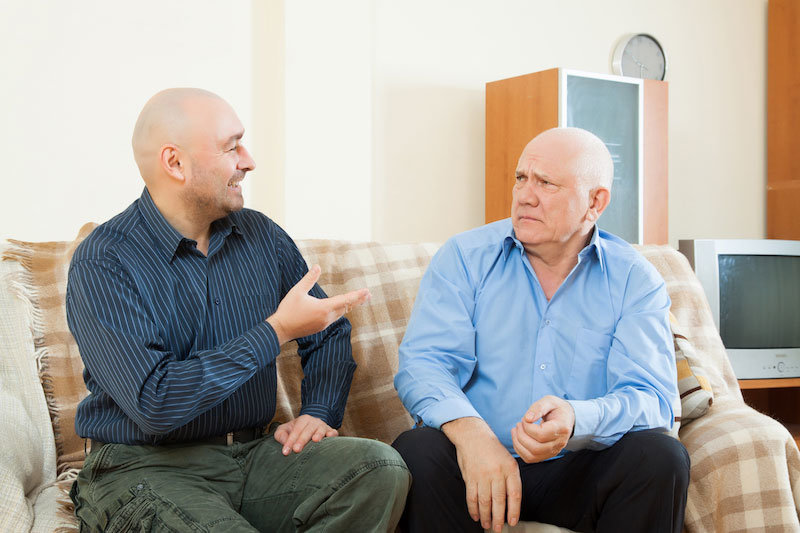 discussion entre un père et son fils, prévention de la fraude financière